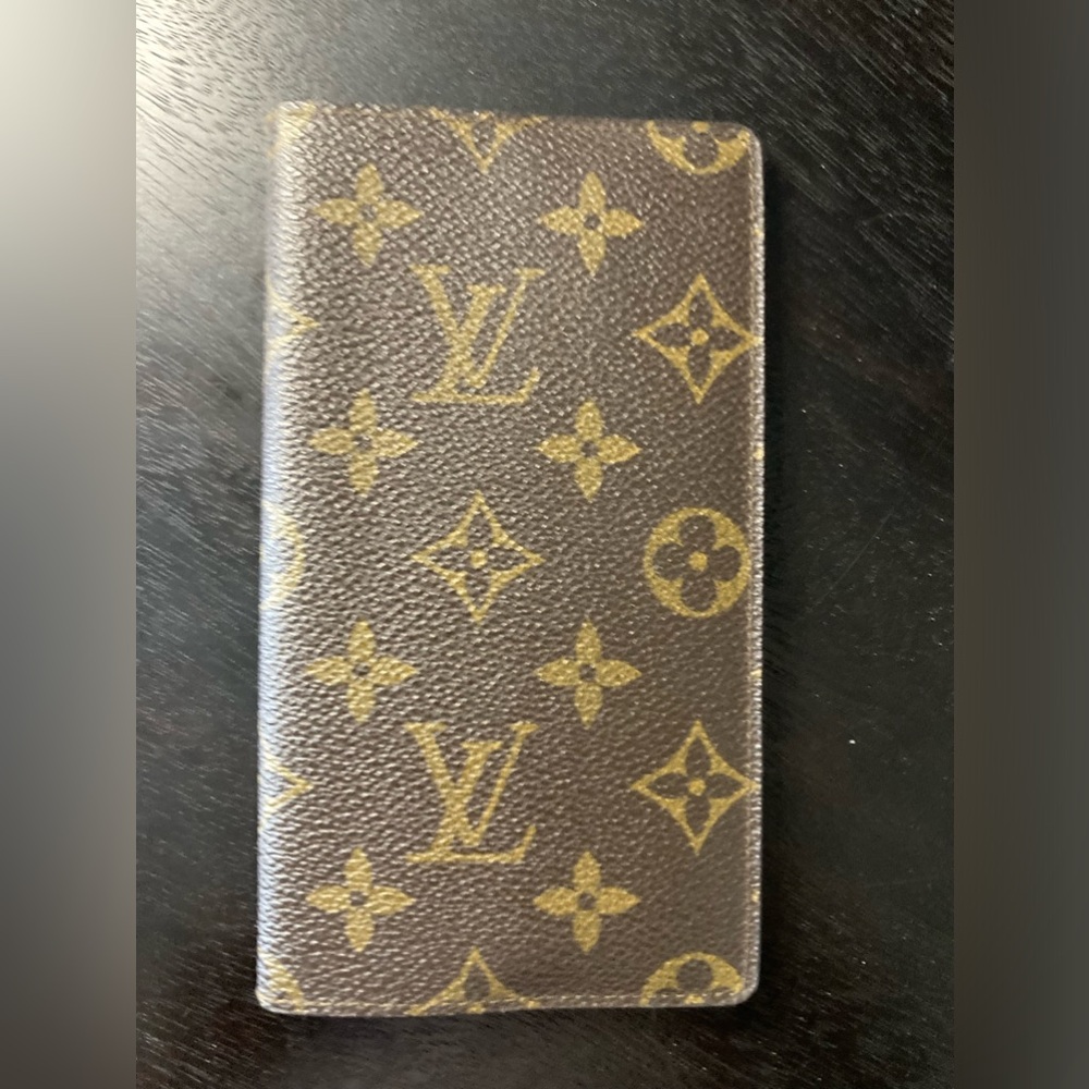 Louis Vuitton check book cover.